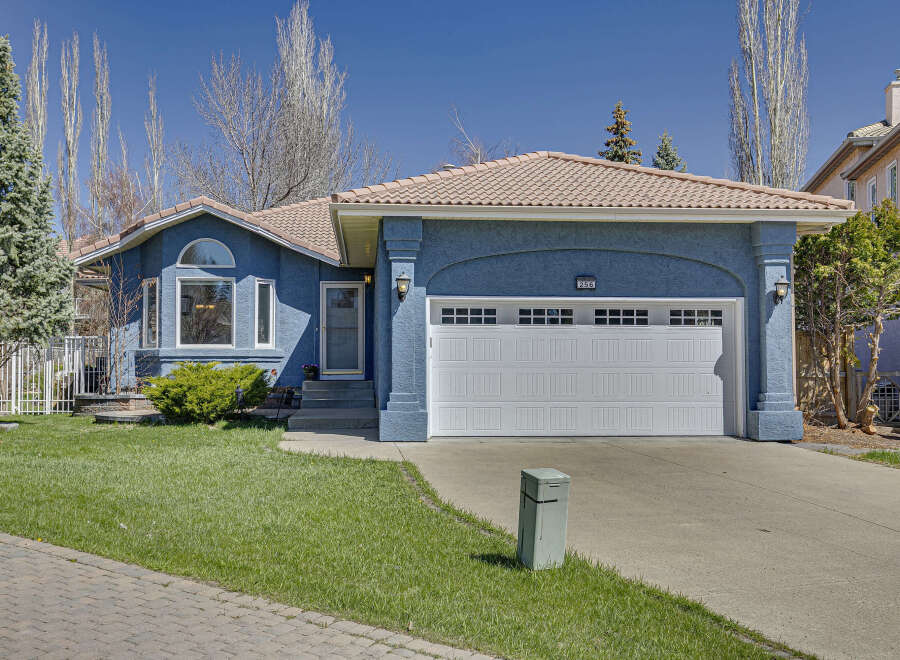 Discover this stunning home featuring a beautiful blue exterior and a welcoming curb appeal.