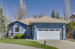 This stunning property boasts a beautiful blue exterior and a charming curb appeal.