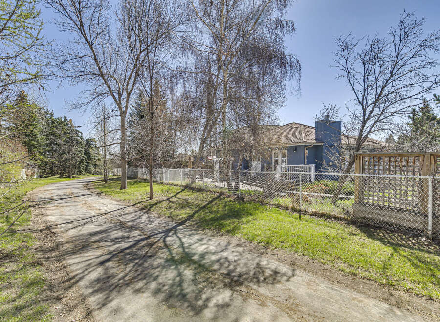 Discover this charming property featuring a beautifully landscaped yard and a welcoming driveway.