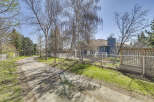 Discover this charming property featuring a beautifully landscaped yard and a welcoming driveway.