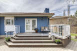 Enjoy outdoor living at its finest with this stunning property featuring a spacious deck and inviting patio.