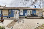 Discover the charm of this stunning property, showcasing a beautifully designed backyard.