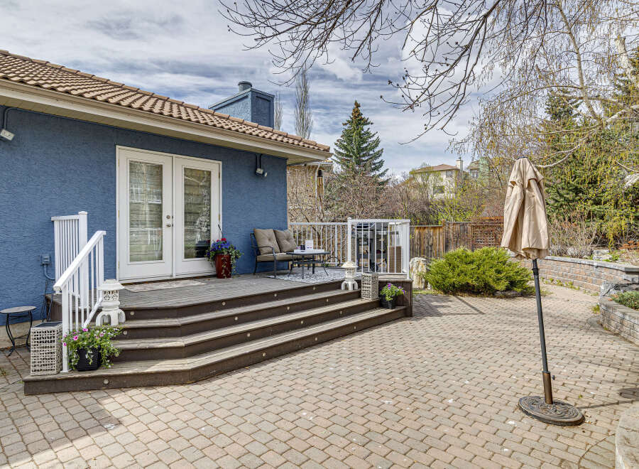 This stunning property boasts a beautifully designed outdoor space, perfect for entertaining or relaxing.