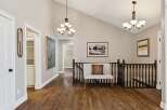 This stunning property boasts a beautifully designed interior with hardwood floors and elegant light fixtures.