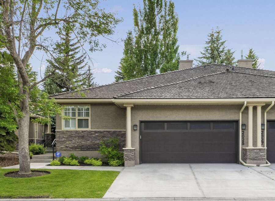 This stunning property boasts a modern design with a beautiful facade.