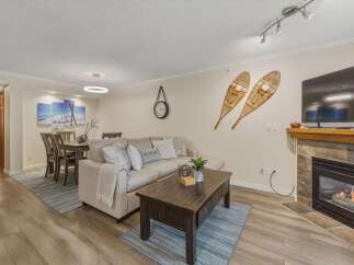 This cozy living space features a comfortable sectional sofa, perfect for relaxing after a long day.
