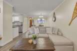 This stunning property boasts a spacious living area, perfect for relaxation and entertaining.