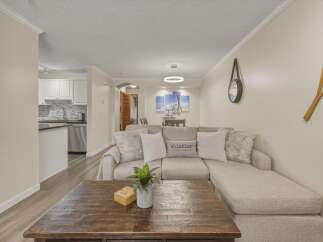 This stunning property boasts a spacious living area, perfect for relaxation and entertaining.