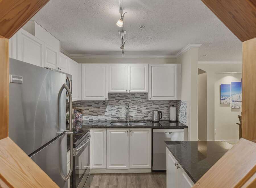 This stunning kitchen boasts modern design and functionality.