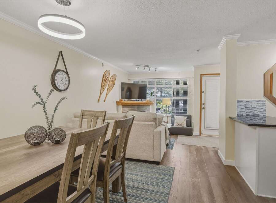 Step into this inviting living space, perfect for both relaxation and entertaining.