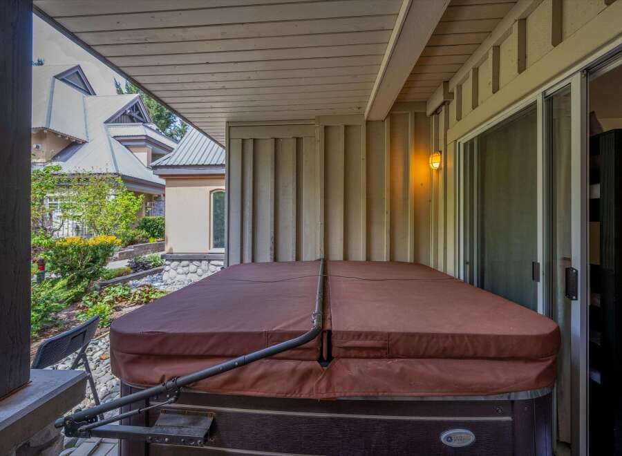 Relax and unwind in this luxurious hot tub, perfect for enjoying the outdoors.