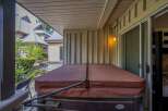 Relax and unwind in this luxurious hot tub, perfect for enjoying the outdoors.