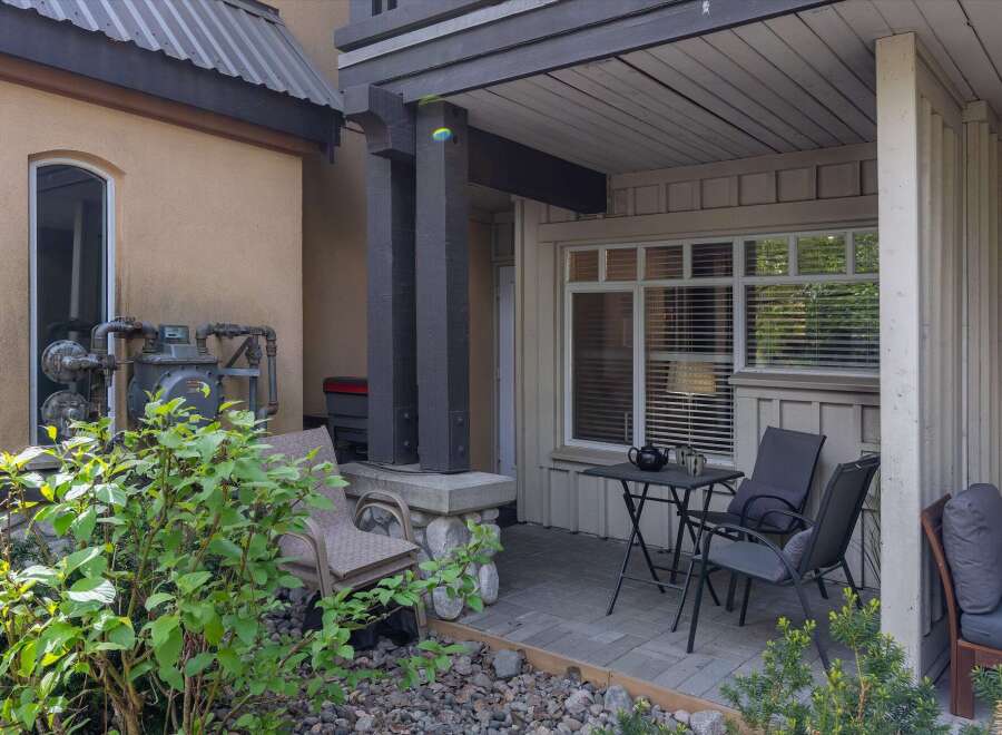 Enjoy the charm of this inviting outdoor space! This property features a cozy patio area, perfect for relaxing or entertaining.