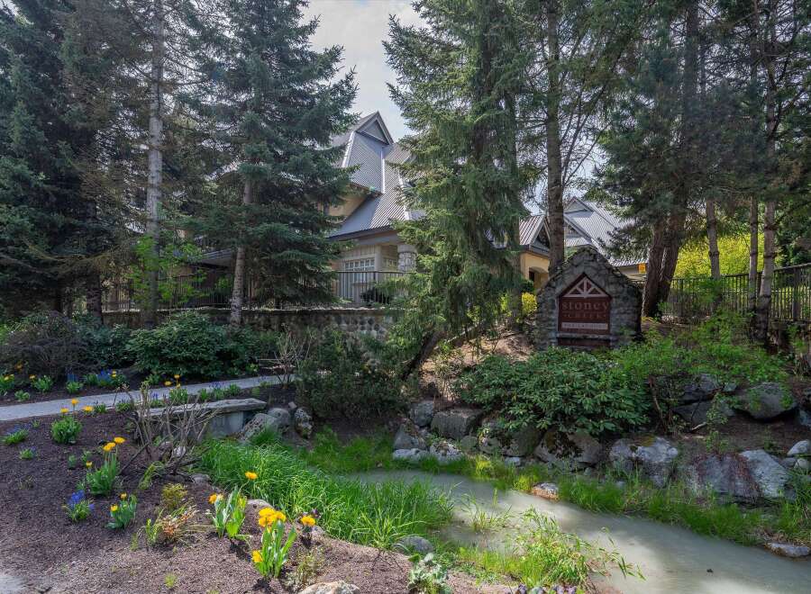 Nestled in a serene, tree-lined setting, this property offers a tranquil escape.