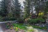 Nestled in a serene, tree-lined setting, this property offers a tranquil escape.