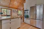 This stunning kitchen boasts a modern design with stainless steel appliances and custom cabinetry.