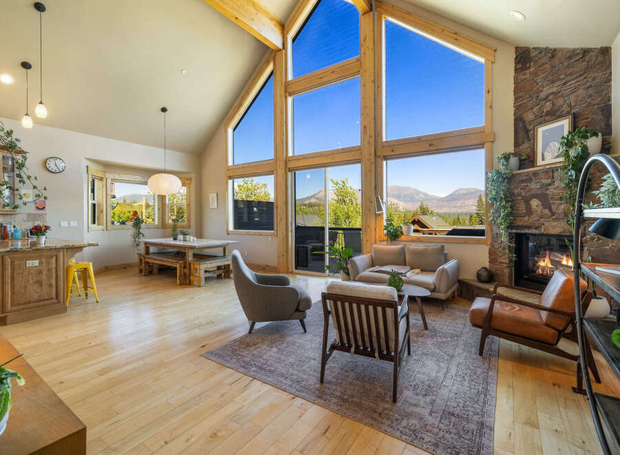 Experience luxury living in this stunning property, featuring a spacious open floor plan and breathtaking mountain views.