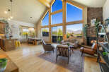 Experience luxury living in this stunning property, featuring a spacious open floor plan and breathtaking mountain views.
