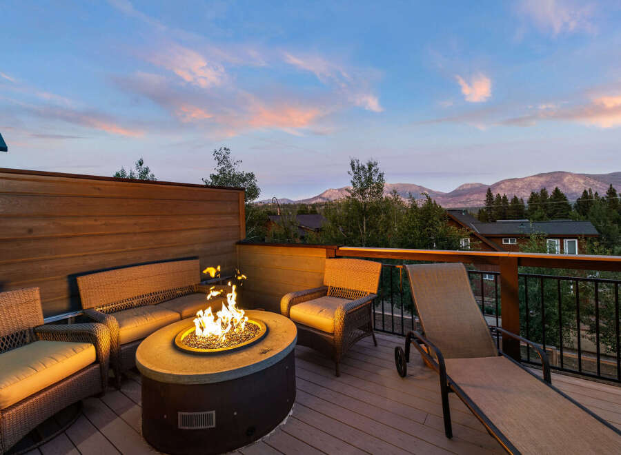 Enjoy breathtaking mountain views from this stunning outdoor living space.