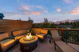 Enjoy breathtaking mountain views from this stunning outdoor living space.