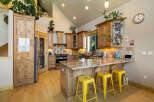 Step into this stunning kitchen, a perfect blend of rustic charm and modern design.