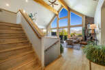 This stunning property boasts a grand staircase leading to a bright and airy living space.