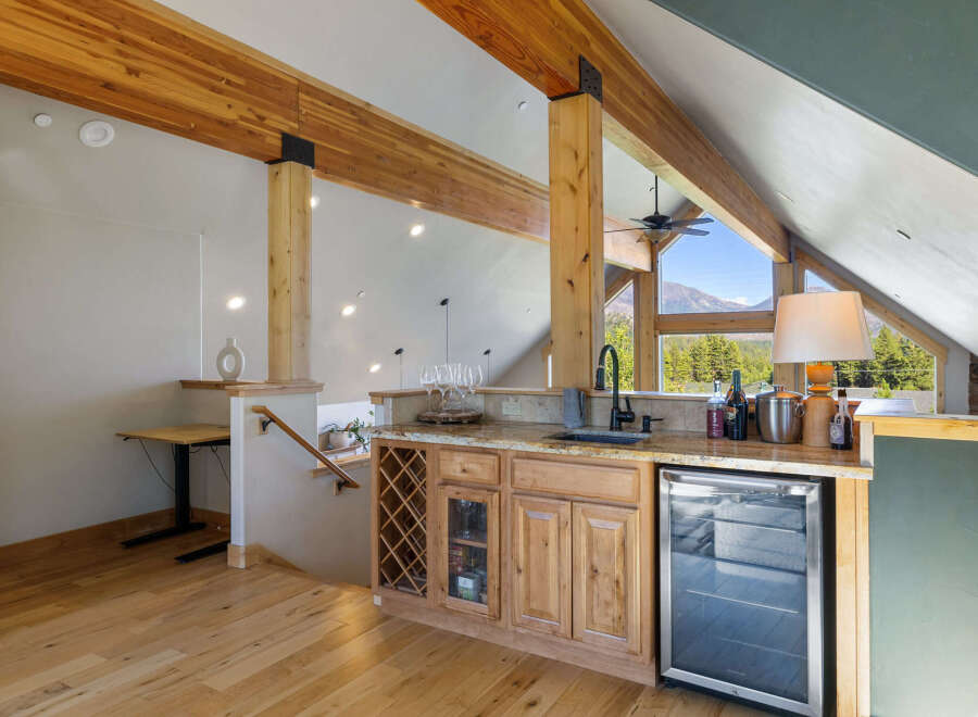 Discover the epitome of luxury living in this stunning property, featuring a beautifully designed wet bar.