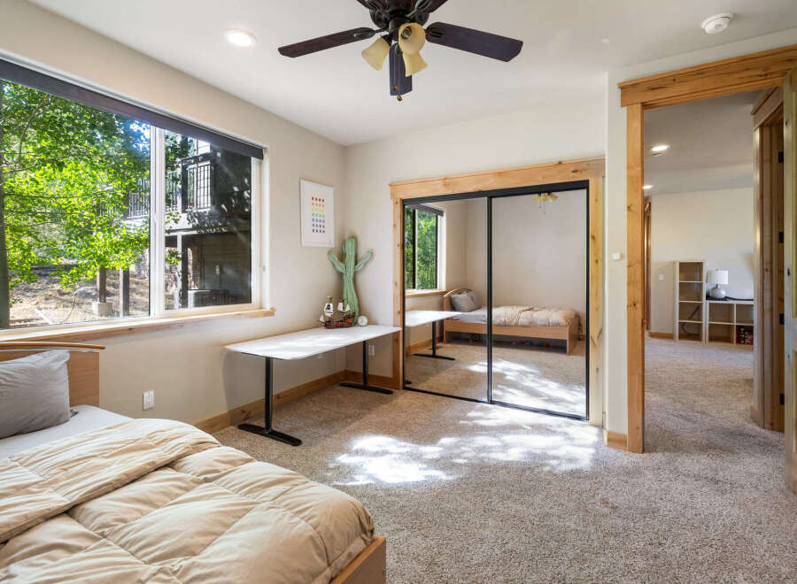This inviting bedroom boasts a bright and airy atmosphere, perfect for relaxation.