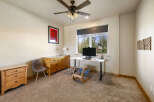 This inviting home office features a bright and airy atmosphere, perfect for productivity.