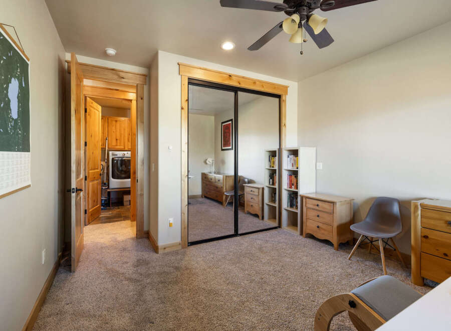 Step into this inviting bedroom, featuring a spacious layout and ample natural light.