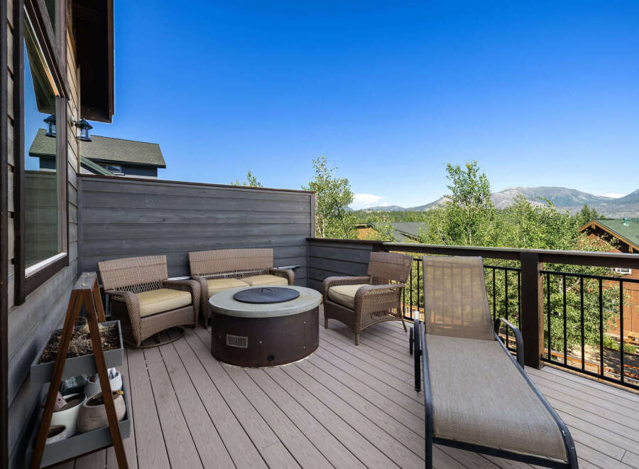 Enjoy breathtaking mountain views from this stunning outdoor deck.