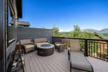 Enjoy breathtaking mountain views from this stunning outdoor deck.