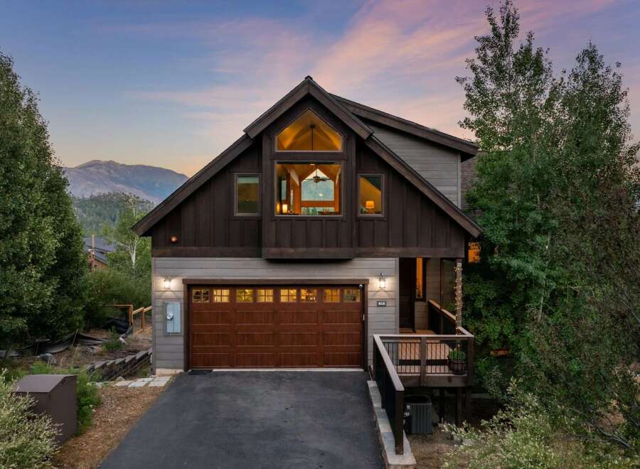 Discover the charm of this stunning mountain home, perfectly blending rustic elegance with modern comfort.