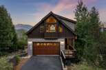 Discover the charm of this stunning mountain home, perfectly blending rustic elegance with modern comfort.