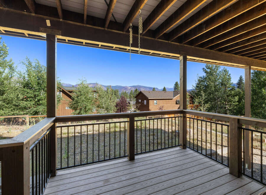 Enjoy breathtaking views from this stunning deck! This property features a spacious outdoor area, perfect for relaxation and entertaining.