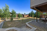 Discover the charm of this stunning property, showcasing a beautifully landscaped yard and a welcoming outdoor space.
