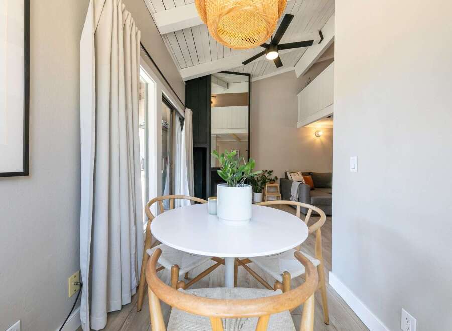 This stunning property features a bright and airy dining area, perfect for entertaining or enjoying a quiet meal.