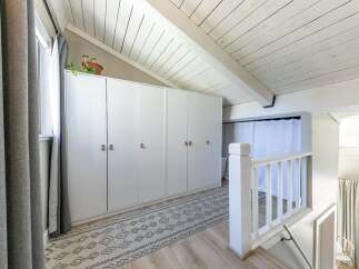 Discover the charm of this bright and airy property, featuring a stylish interior with a modern aesthetic.