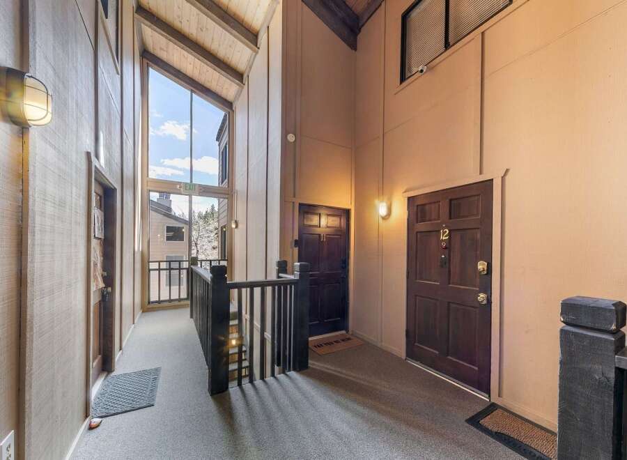 Step into a welcoming entryway with a unique architectural design.
