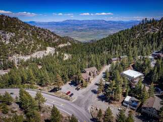 Nestled amidst the breathtaking beauty of the mountains, this property offers a serene escape.