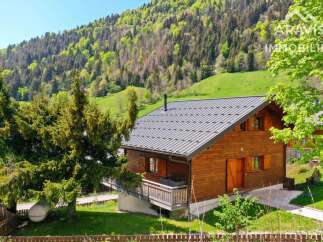 Discover your dream chalet nestled in the heart of nature! This stunning wooden property boasts a charming design, perfect for a cozy retreat.