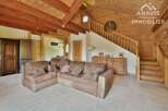 Discover the charm of this stunning property, featuring a spacious living area with a cozy sectional sofa.