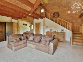 Discover the charm of this stunning property, featuring a spacious living area with a cozy sectional sofa.