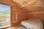 Discover a cozy retreat in this charming wooden cabin.