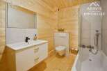Discover the charm of this beautifully designed bathroom, featuring a modern vanity and a sleek, contemporary design.