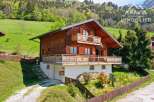 Discover your dream chalet nestled in the heart of the mountains! This charming property boasts a classic wooden facade, offering a warm and inviting atmosphere.