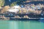 Nestled in a picturesque mountain setting, this property offers stunning views of the surrounding landscape and a serene lake.