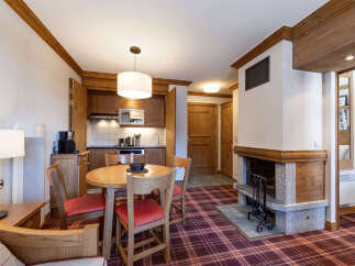 Discover the charm of this cozy property, featuring a well-equipped kitchen and a welcoming dining area perfect for gatherings.