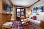 Step into this cozy living space, perfect for relaxing after a day on the slopes.