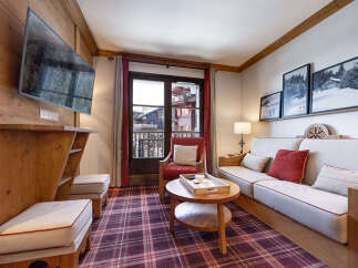 Step into this cozy living space, perfect for relaxing after a day on the slopes.